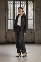 Jane Lushka Nevada black barrel leg women’s jeans styled with jacket