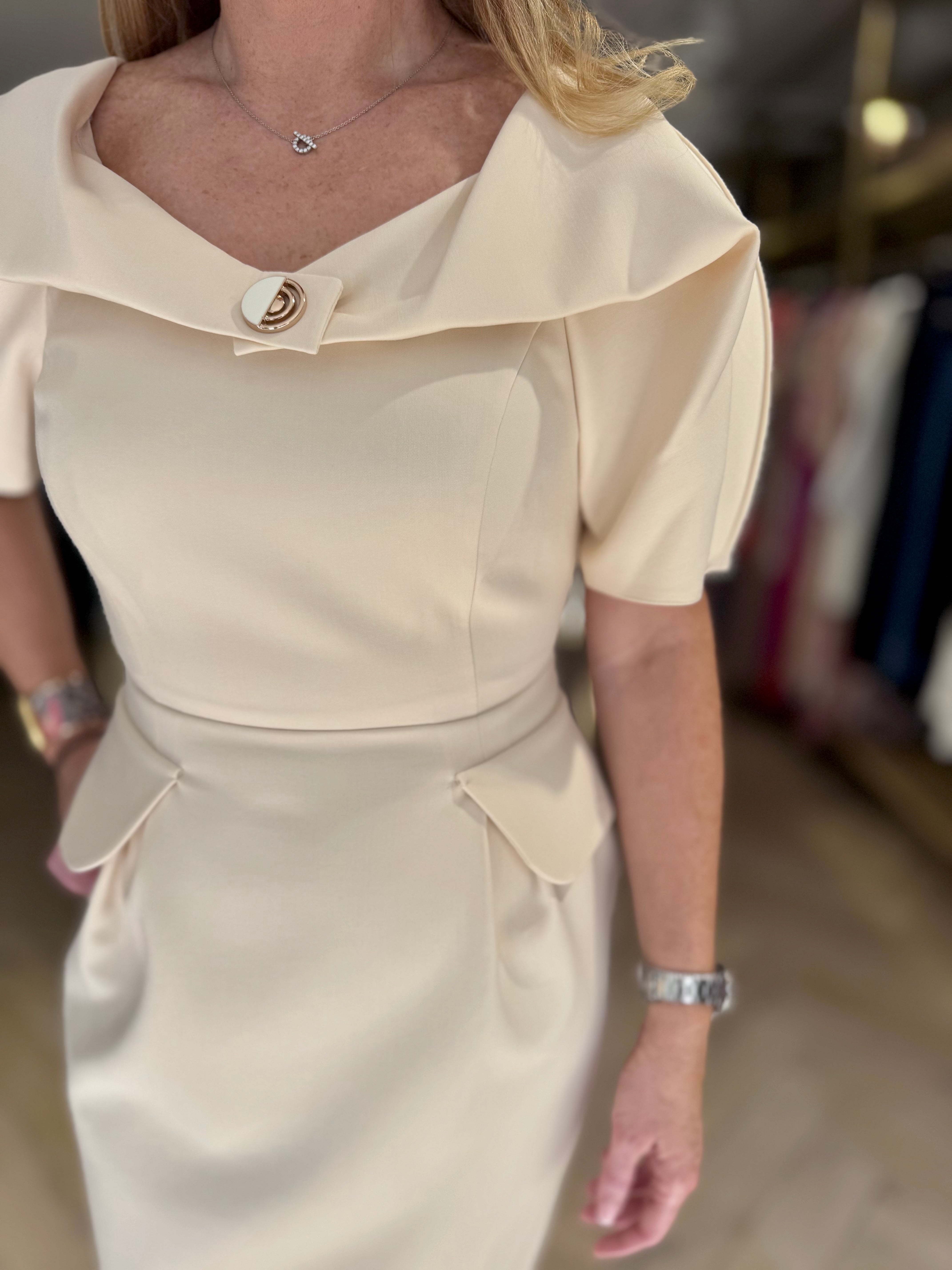 Close-up of neckline and draped shoulder detail on Kameya Draped Shoulder Midi Dress