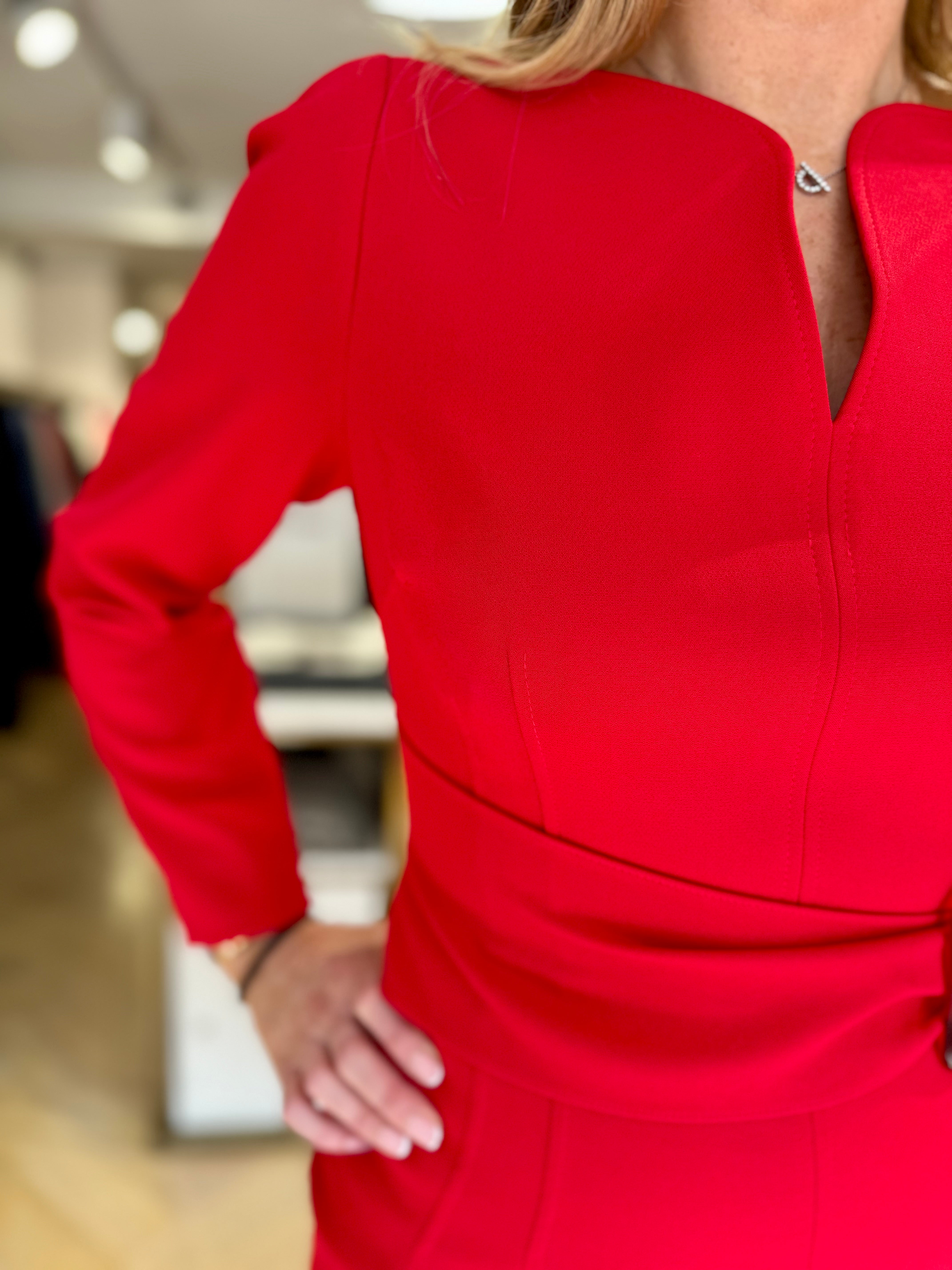 Detail shot of neckline and bodice of Kameya red belted slit neckline dress