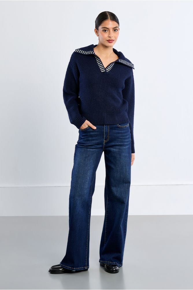 Lili Sidonio navy V-neck studded collar jumper styled with jeans
