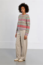 Lili Sidonio multicolour geometric cardigan styled with cream trousers