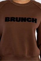 Lili Sidonio brown sweatshirt black Brunch slogan detail close-up