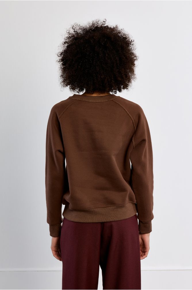 Lili Sidonio brown oversized slogan sweatshirt back view