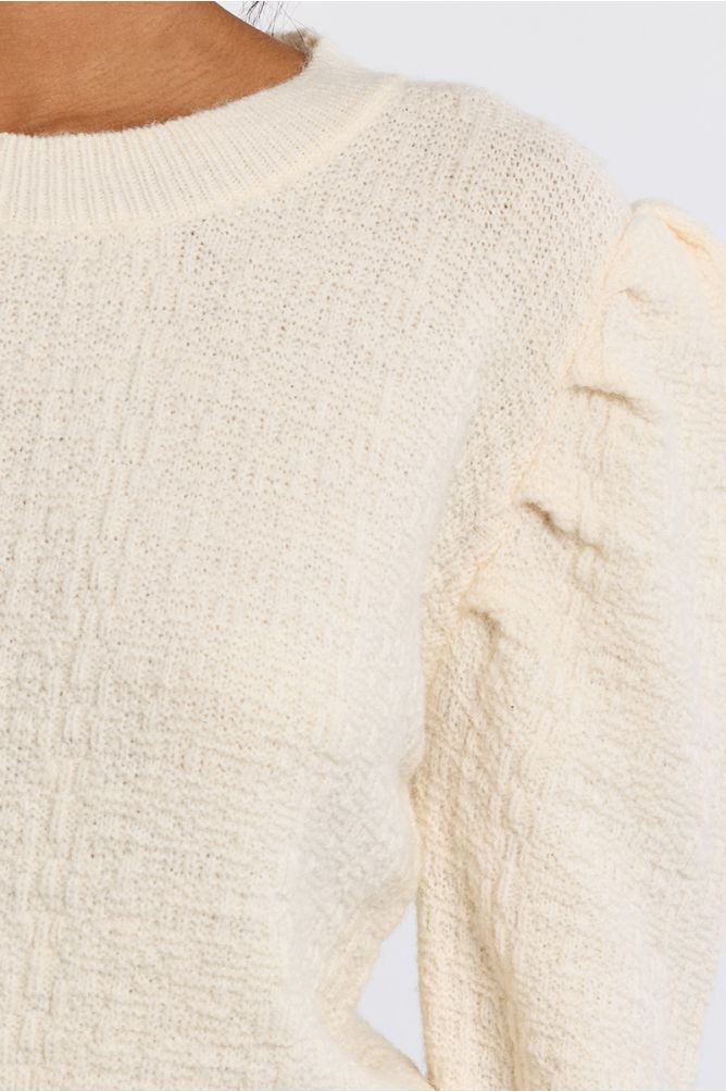 Lili Sidonio cream knit jumper balloon sleeve detail close-up