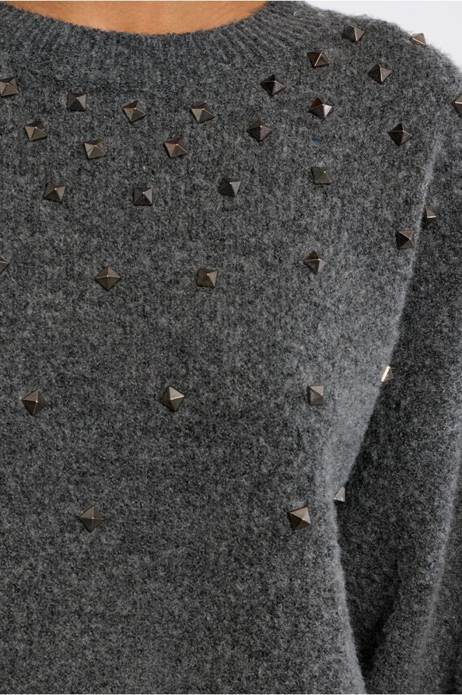 Lili Sidonio grey knit jumper metallic stud detail close-up