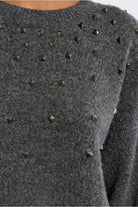 Lili Sidonio grey knit jumper metallic stud detail close-up