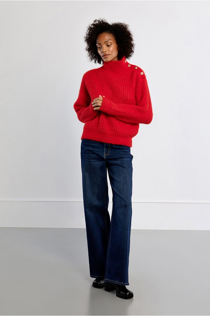 Lili Sidonio red fluffy button detail jumper styled with jeans