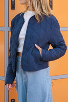 Lili Sidonio navy quilted zip jacket quilted patch pocket detail