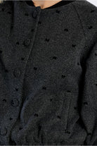 Lili Sidonio dark grey tweed jacket black bow detail close-up