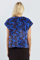 Rear view of blue leopard print gilet by Lili Sidonio