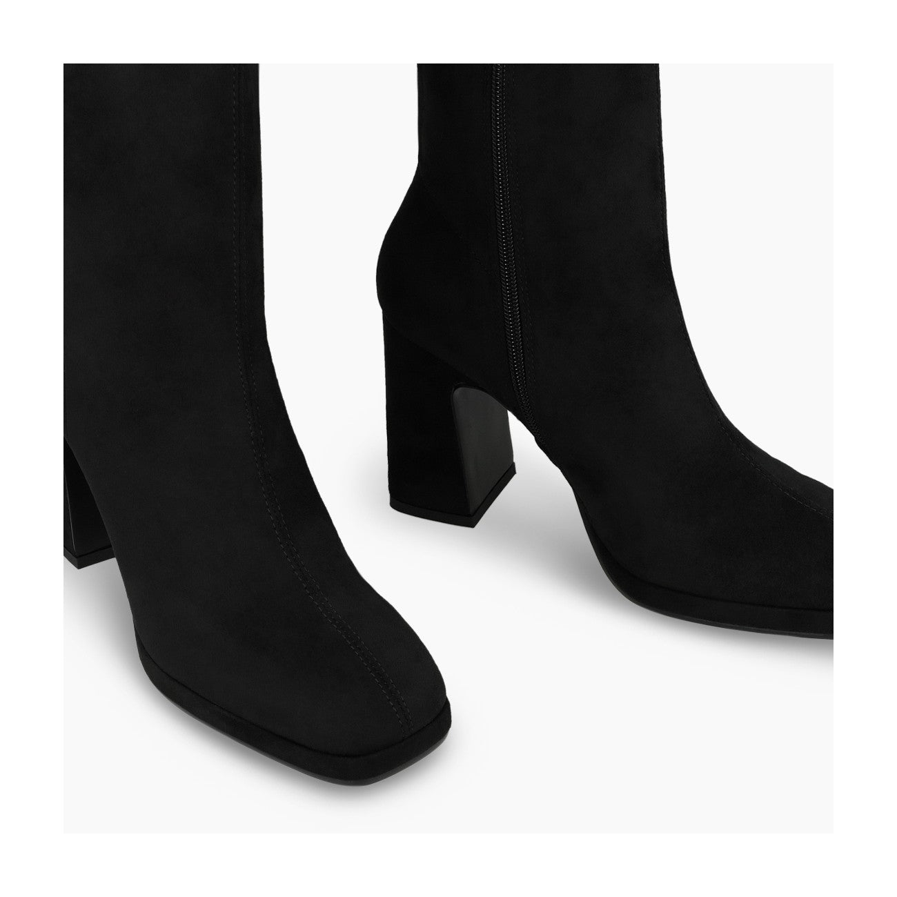 Black suede Laira ankle boots, close-up of heel 