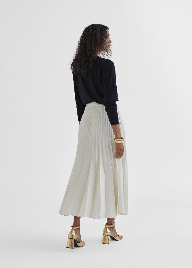 Lola Casademunt Cream Pleated Midi Skirt From The Back 