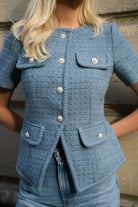 Blue Love Lolina short sleeve tweed top styled with jeans in Paris