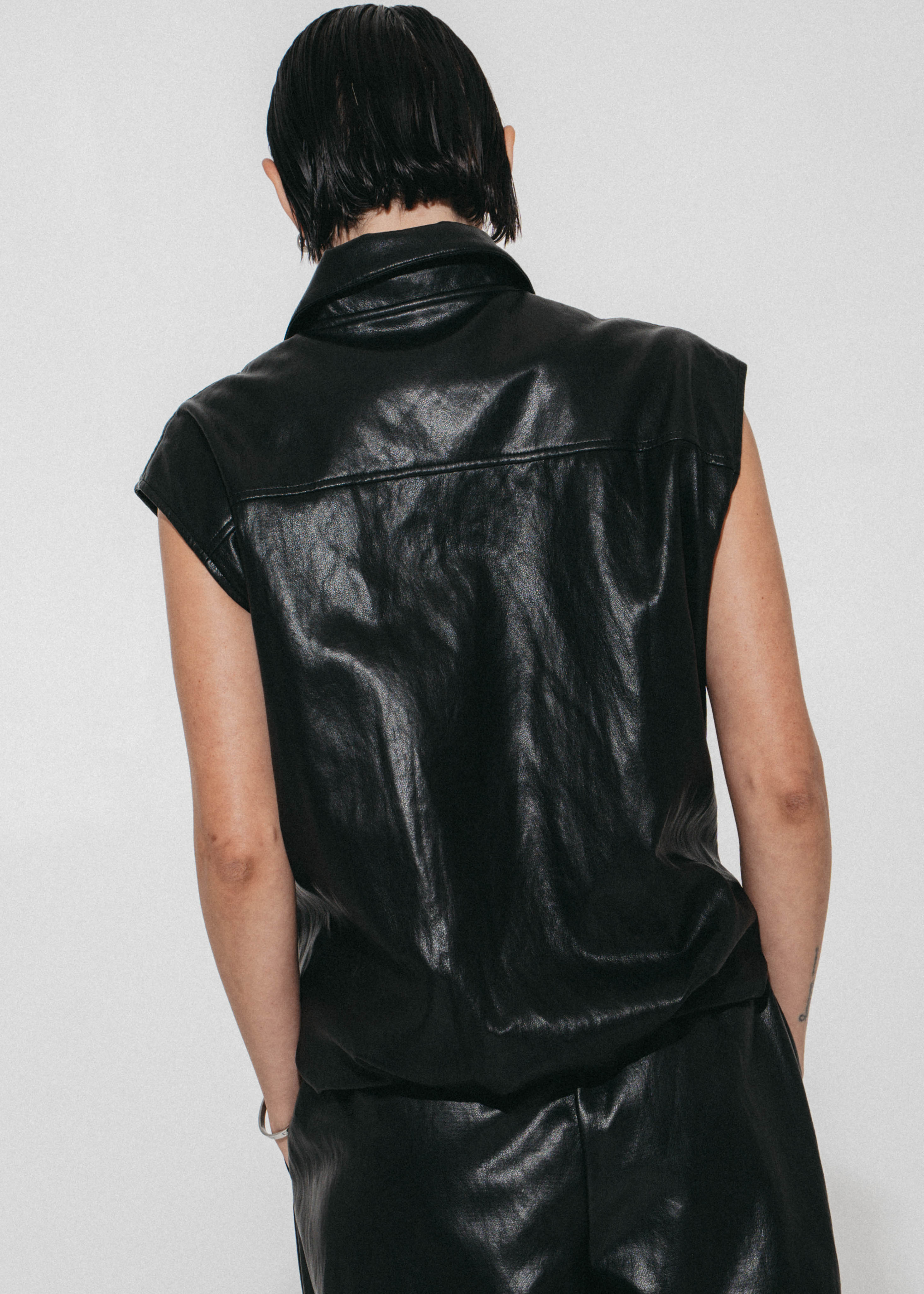 Luje Alora black faux leather vest back view