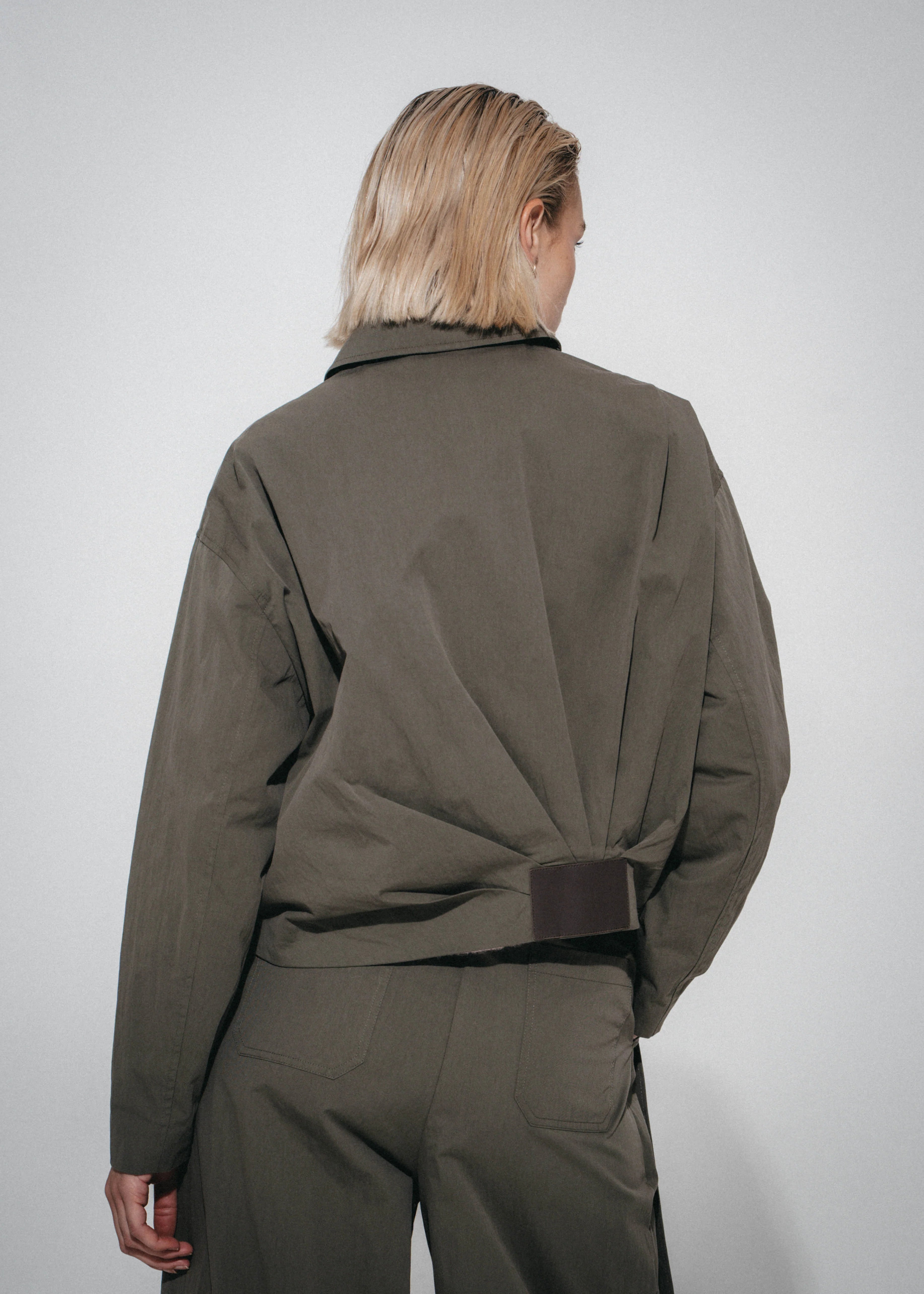 Luje Blaze khaki bomber jacket back pleat detail