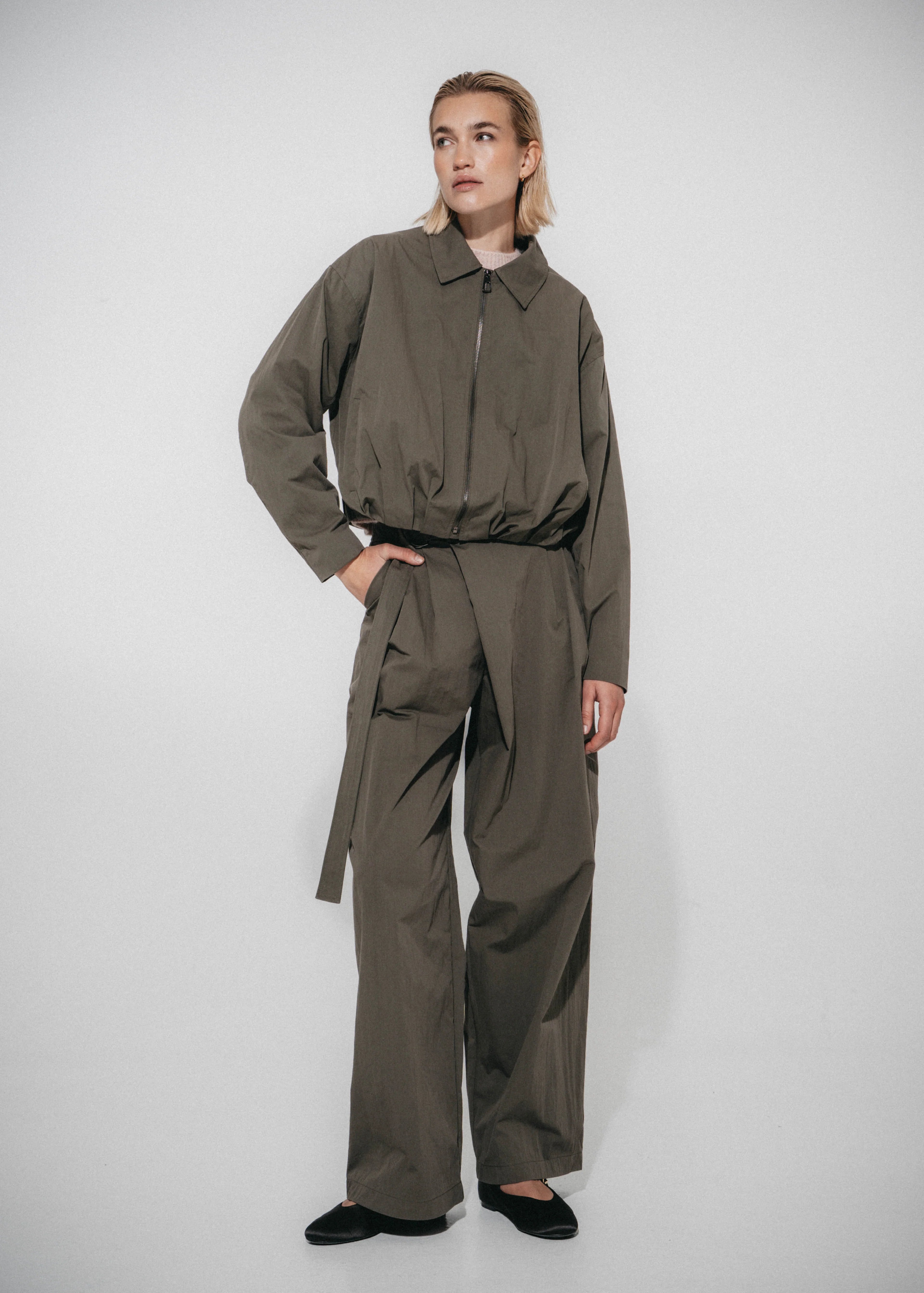 Luje Blaze pleated khaki bomber jacket full-length front view