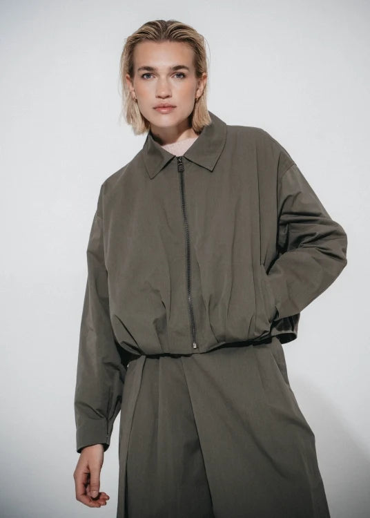 Luje Blaze khaki pleated bomber jacket front view on model