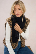 Molly Bracken black scarf styled casually with jeans and soft knitwear