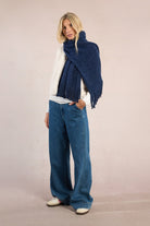 Molly Bracken navy scarf worn loose over shoulders