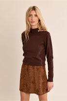 Molly Bracken women’s brown high neck knit jumper styled with skirt