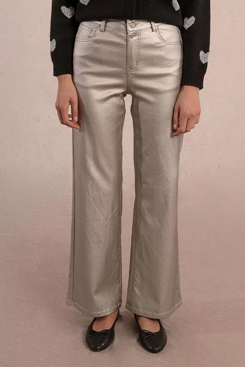 Close-up of metallic coated finish on Molly Bracken silver wide leg jeans