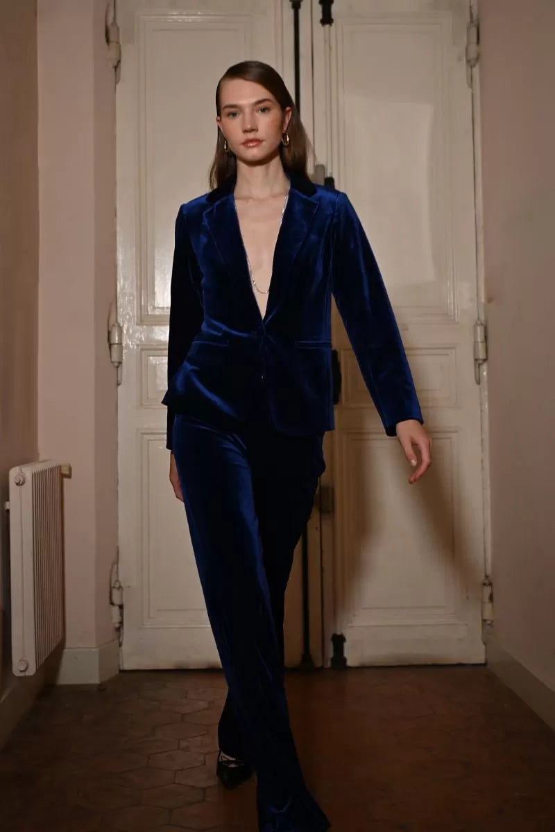 Tailored navy velvet trousers styled with matching jacket By Molly Bracken