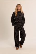 Molly Bracken leopard print high neck jumper styled with matching trousers