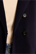 Molly Bracken navy women’s blazer close-up showing double breasted button detail