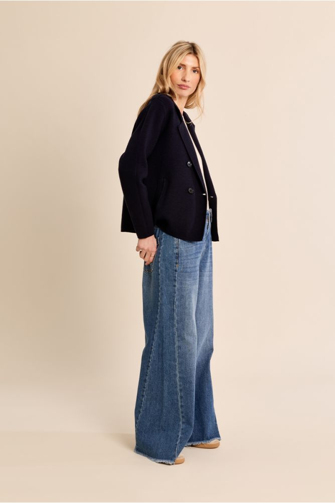 Molly Bracken navy double breasted blazer side view styled with jeans