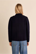 Molly Bracken navy cropped blazer back view on model