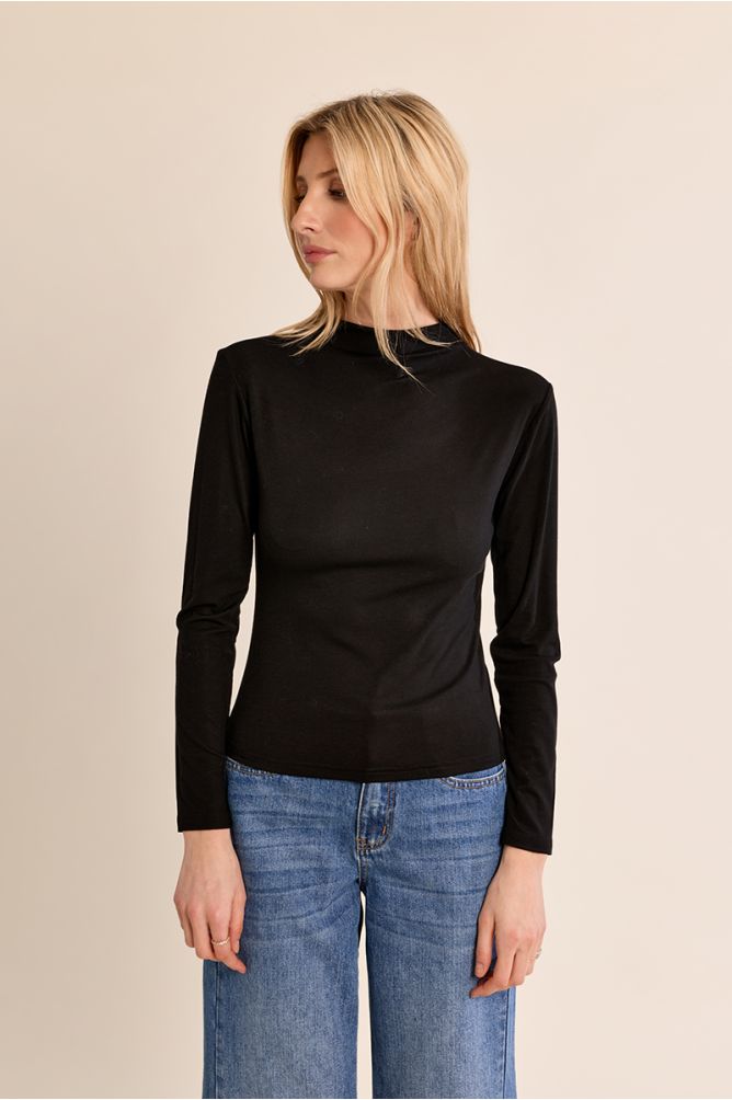 Molly Bracken women’s black fitted long sleeve top on model
