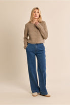 Molly Bracken women’s beige flecked cardigan styled with blue jeans