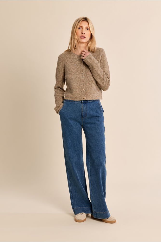 Molly Bracken women’s beige flecked cardigan styled with blue jeans