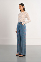 Molly Bracken heart embroidered wide leg jeans side view on model