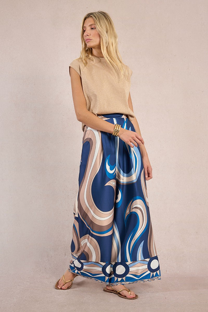 Molly Bracken silky graphic print wide leg trousers styled with beige top