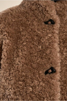  Molly Bracken brown faux sheepskin jacket texture and toggle detail close-up