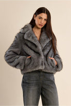 Molly Bracken women’s grey faux fur jacket on model