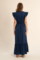 Molly Bracken navy cotton maxi dress smocked waist and ruffle sleeve detail From back 