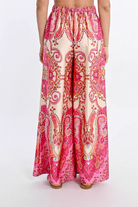 Back view of paisley print wide-leg trousers with elastic waistband