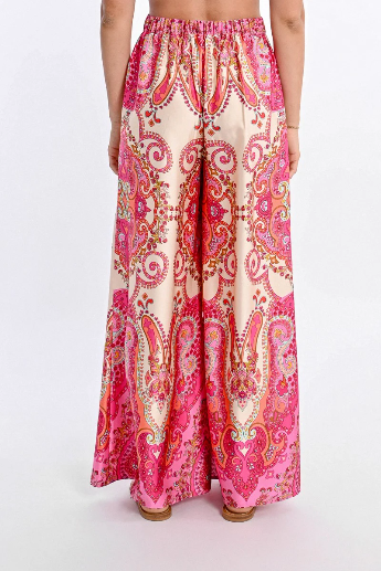 Back view of paisley print wide-leg trousers with elastic waistband