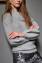 Close-up of grey Molly Bracken knit jumper with sequins and draped neckline