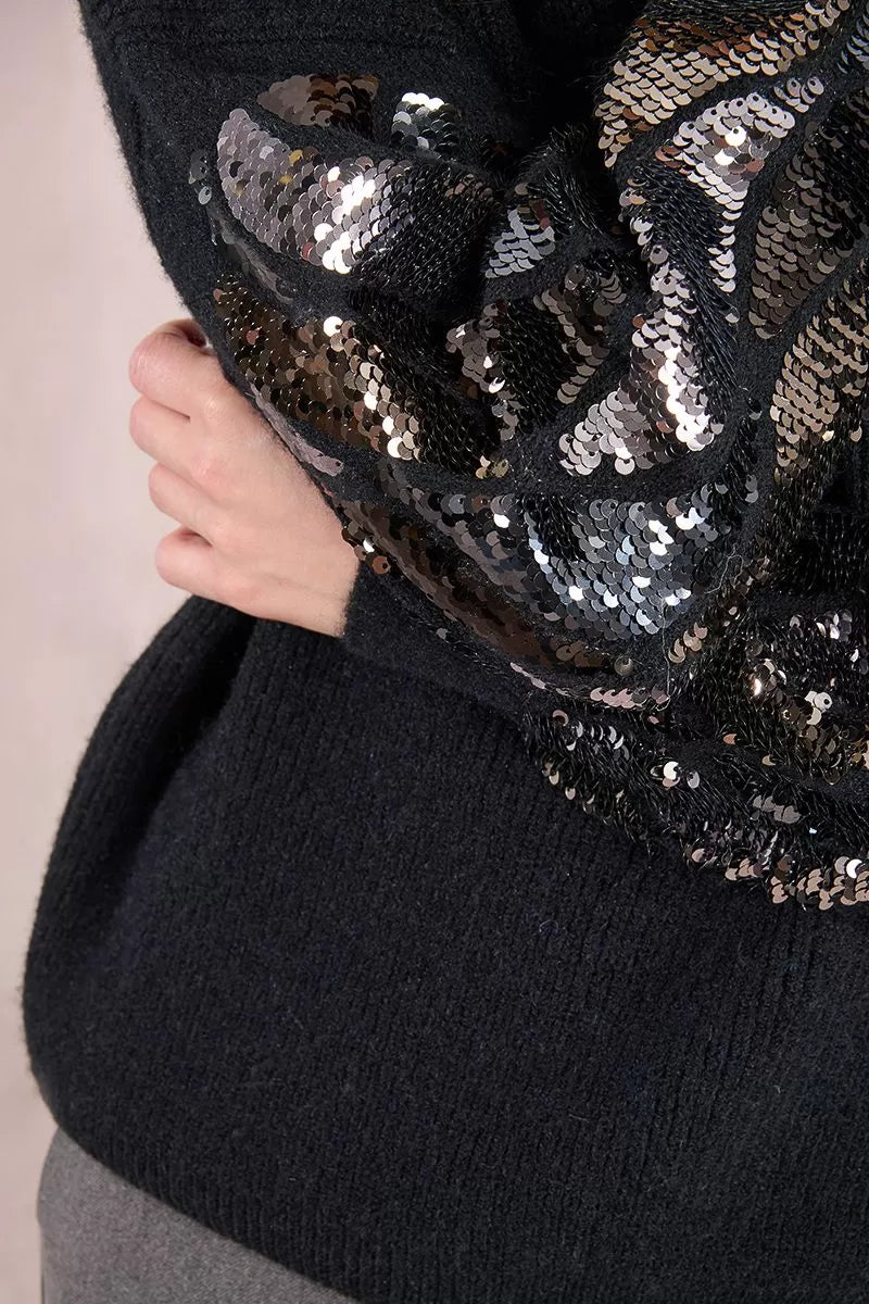 Close-up of silver sequin detailing on black knit sleeved Molly Bracken Jumper