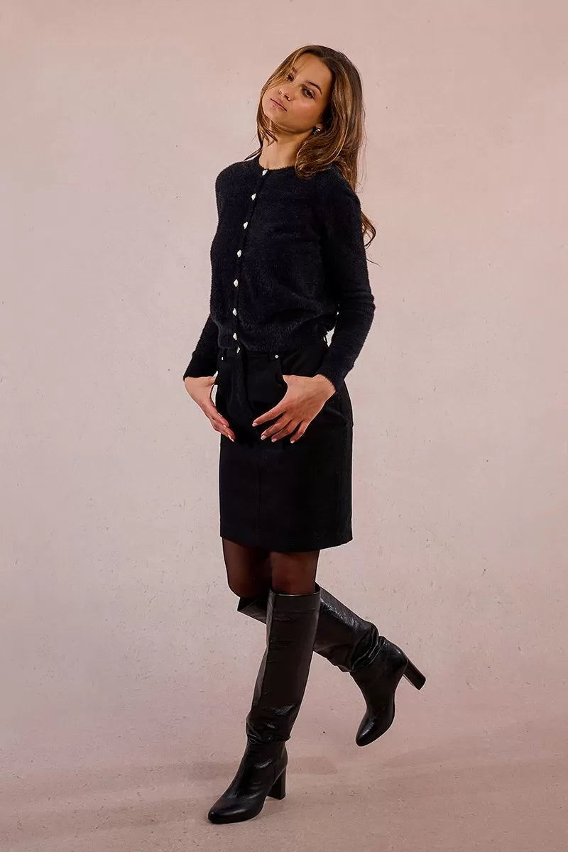 Cosy black cardigan styled with skirt – Molly Bracken knitwear
