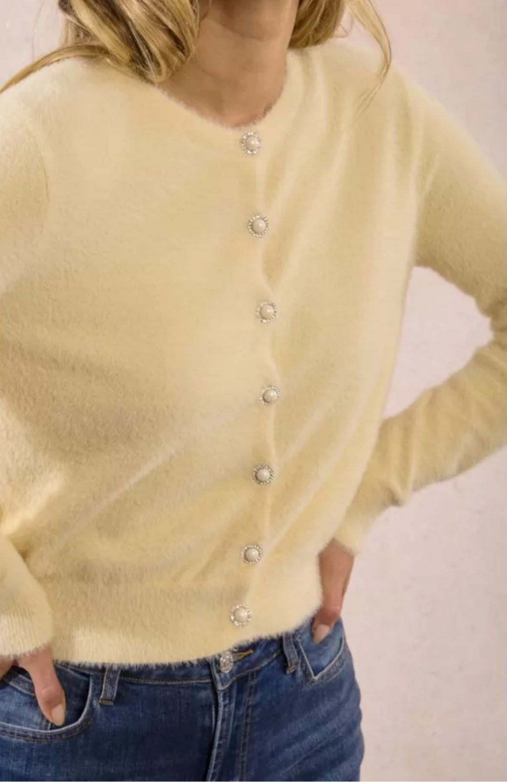 Molly Bracken cardigan close-up showing fluffy texture and decorative buttons