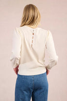 Back view of Molly Bracken cream knit jumper for women with bow detail down the back 