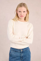Model wearing Molly Bracken bow cuff jumper with balloon sleeves