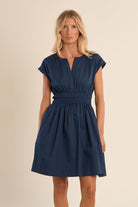 Molly Bracken navy smocked waist l short cotton dress front