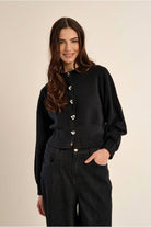 Molly Bracken women’s black heart button cardigan on model