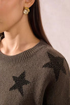 Molly Bracken khaki knit fabric texture with glittery star detail