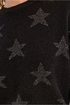 Molly Bracken black knit jumper close-up showing iridescent star pattern